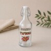 Стъклена бутилка с дръжка