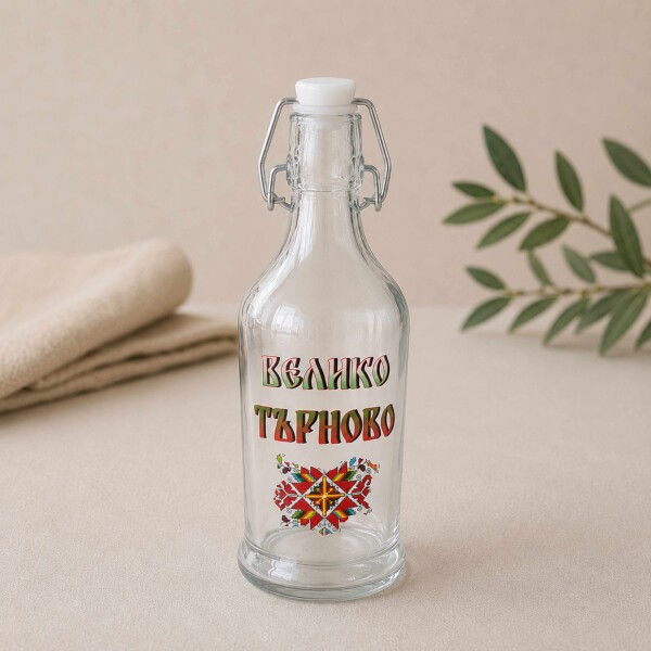 Стъклена бутилка с дръжка